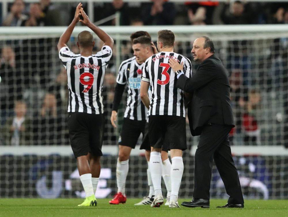Newcastle United manager Rafael Benitez, Paul Dummett and Salomon Rondon after the match. REUTERS/Scott Heppell