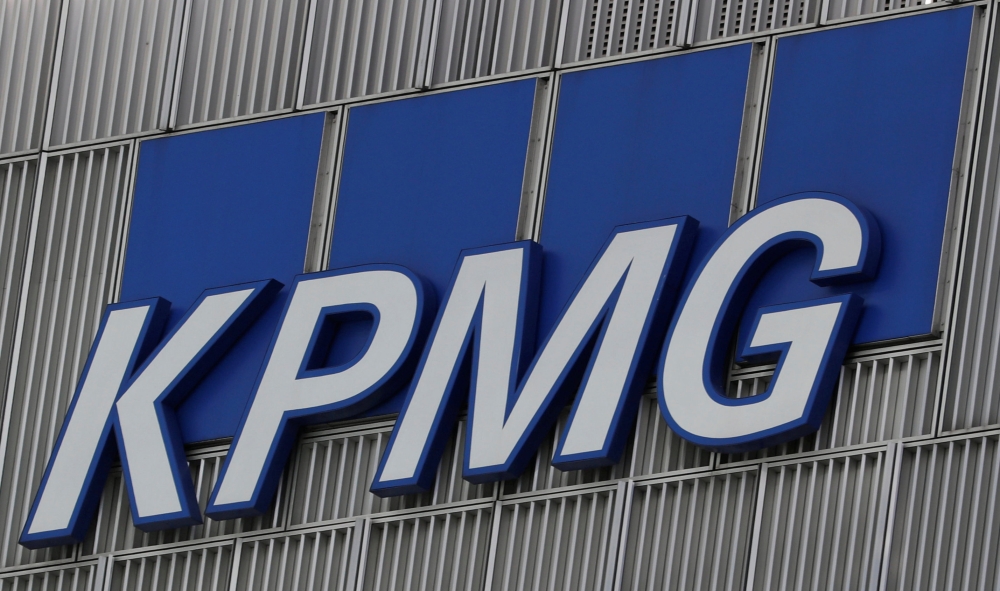 FILE PHOTO: The KPMG logo is seen at their offices at Canary Wharf financial district in London,Britain, March 3, 2016. Reuters/Reinhard Krause