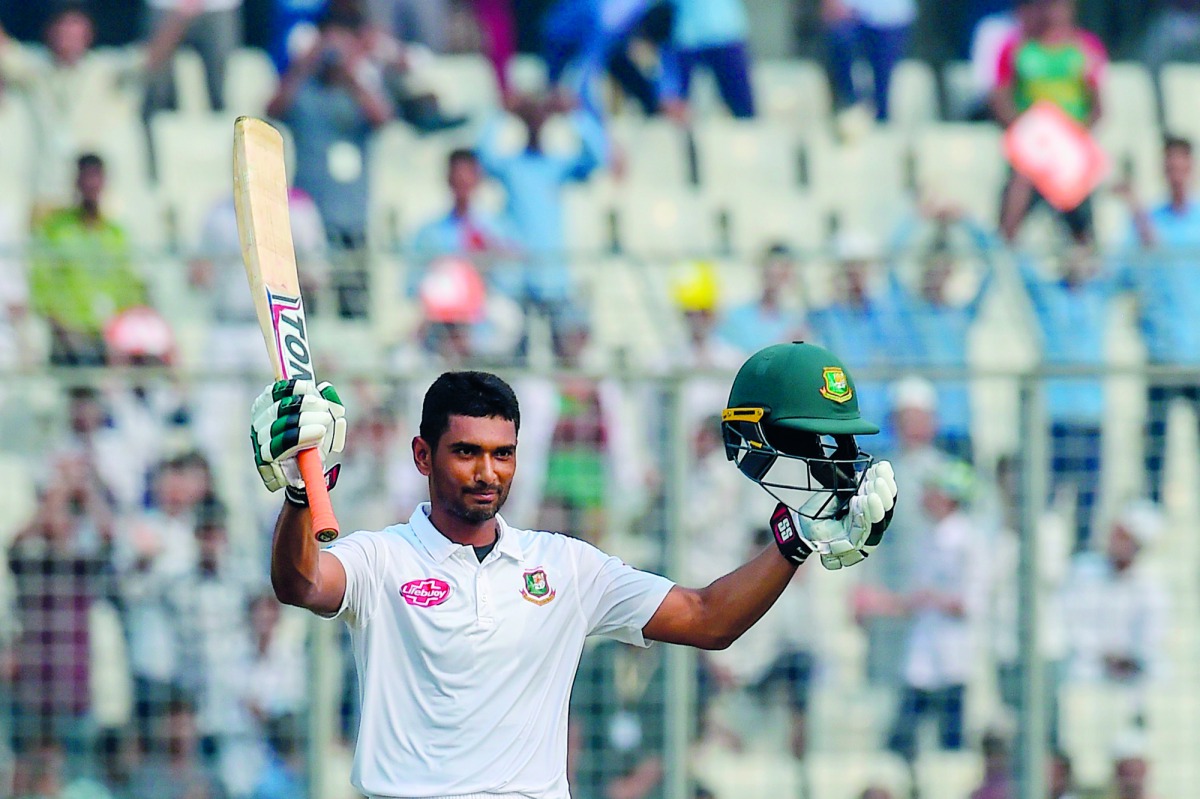 Bangladesh cricket captain Mohammad Mahmudullah reacts after scoring a century during the fourth day of the second Test cricket match between Bangladesh and Zimbabwe at the Sher-e-Bangla National Cricket Stadium in Dhaka on November 14, 2018. AFP / Munir 