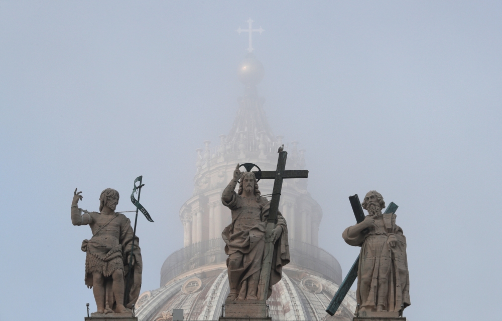 The dome of Saint Peter's Basilica is seen covered in fog, before Pope Francis' weekly general audience in Saint Peter's Square at the Vatican November 14, 2018. Reuters/Max Rossi 