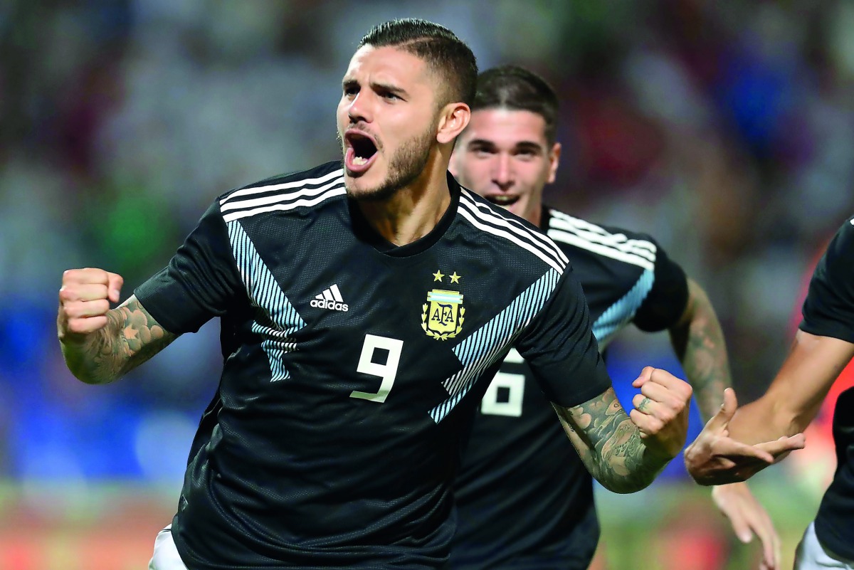 Argentina's Mauro Icardi celebrates scoring their first goal. Reuters/Marcelo Ruiz 