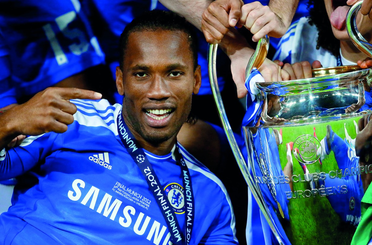 Chelsea's Didier Drogba celebrates with the trophy after their Champions League final soccer match against Bayern Munich at the Allianz Arena in Munich May 19, 2012. Reuters/Kai Pfaffenbach