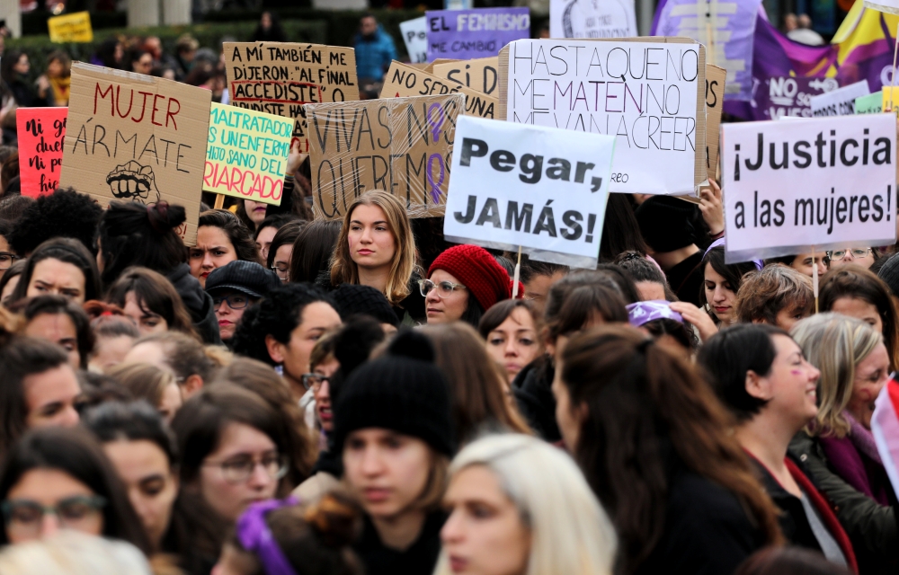 People attend a rally against gender-based and sexual violence against women in Madrid, Spain, November 25, 2018. REUTERS/Sergio Perez