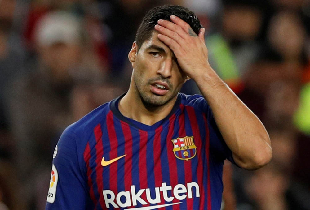 Barcelona's Luis Suarez dejected REUTERS/Albert Gea/File Photo