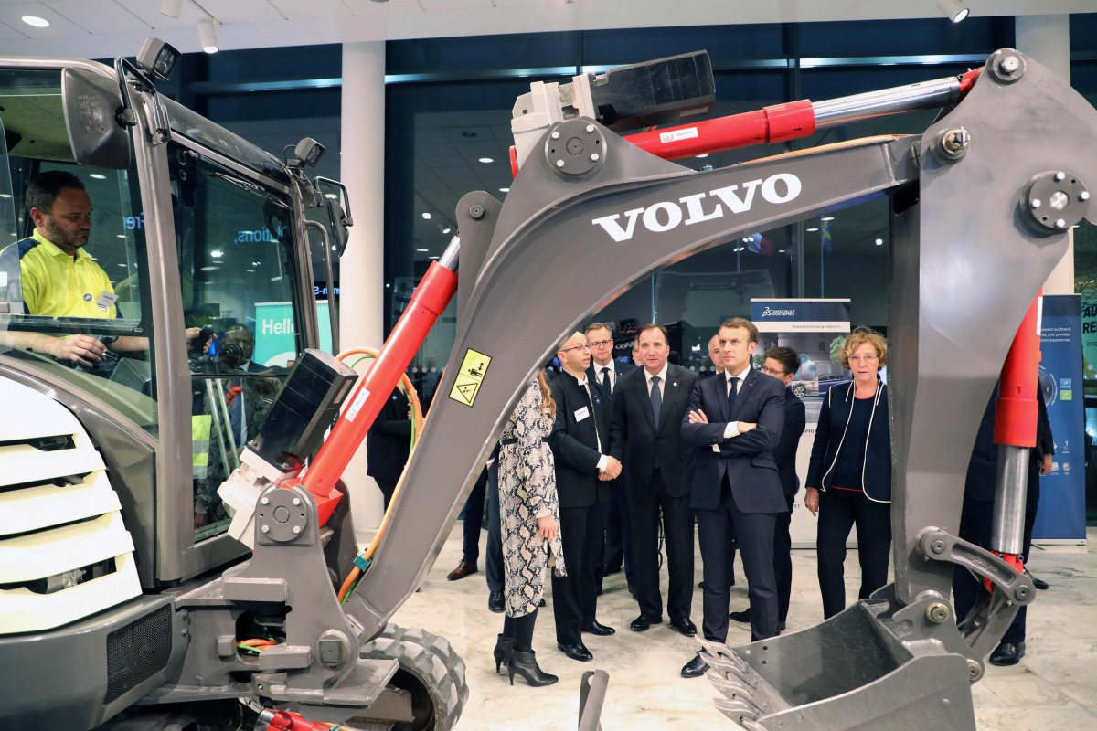 FILE PHOTO: Emmanuel Macron and Swedish PM Stefan Lofven at Volvo Campus, Lundby on the sidelines of the European Social Summit in Gothenburg on Nov 17, 2017. AFP/Ludovic Marin