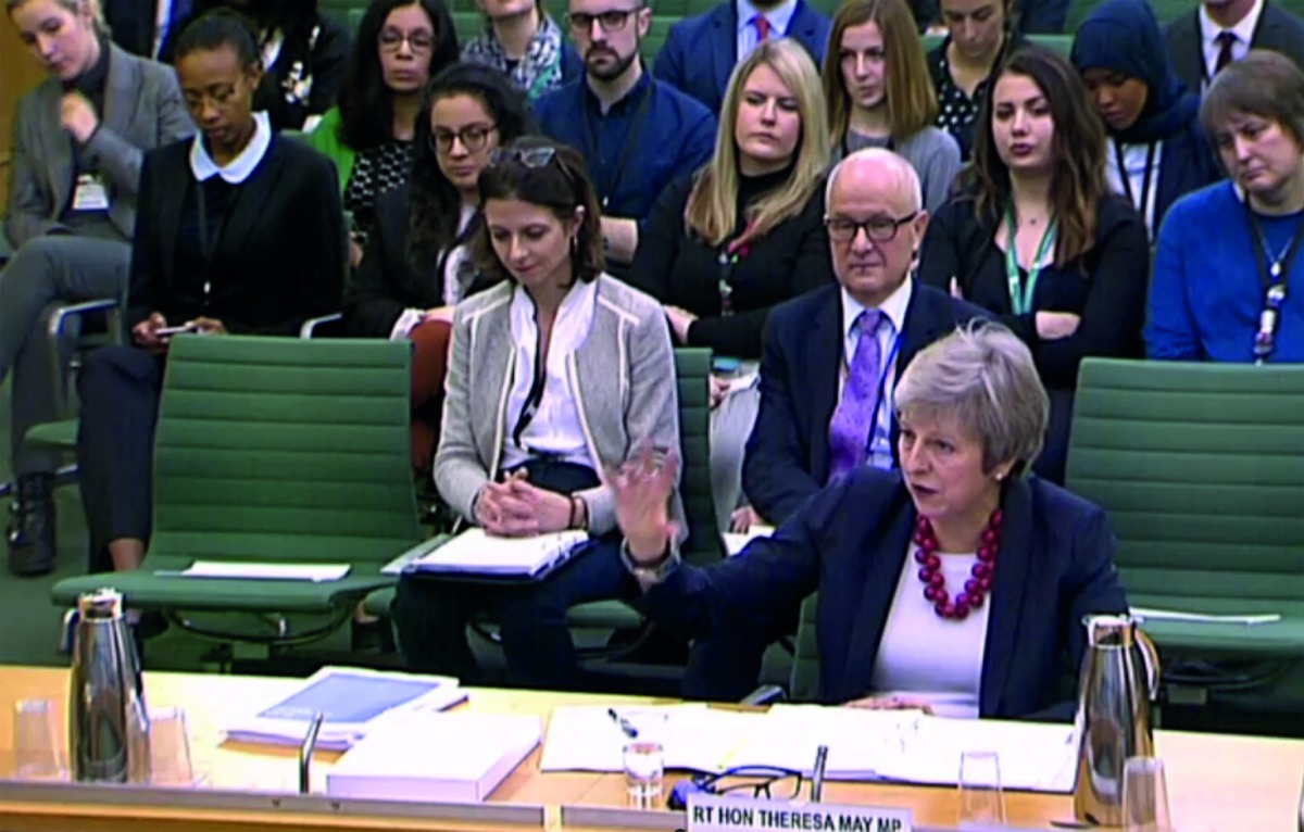 A video grab from footage broadcast by the UK Parliament's Parliamentary Recording Unit (PRU) shows Britain's Prime Minister Theresa May answer questions about her Brexit agenda by British MP's at a Parliamentary liaison committee meeting on November 29, 