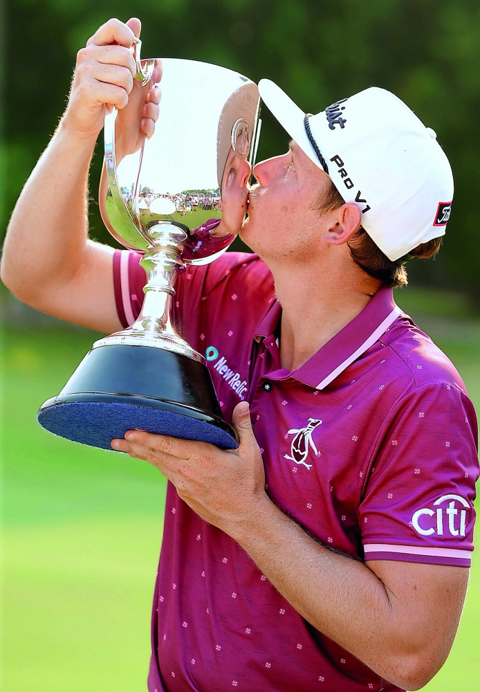 Australia's Cameron Smith kisses the trophy after winning the Australian PGA Golf Championship at the Royal Pines Resort on the Gold Coast, in Australia December 2, 2018. AAP/Tim Marsden/via Reuters