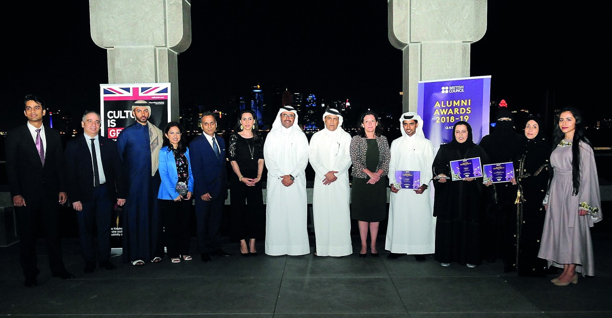 H E Dr Mohammed bin Saleh Al Sada (centre), British Ambassador Ajay Sharma (fifth left), HSBC Qatar CEO Abdul Hakeem Mostafawi (seventh right), and other dignitaries with Qatar’s first Study UK Alumni Awards winners at MIA on Saturday. Pic: Abdul Basit / 