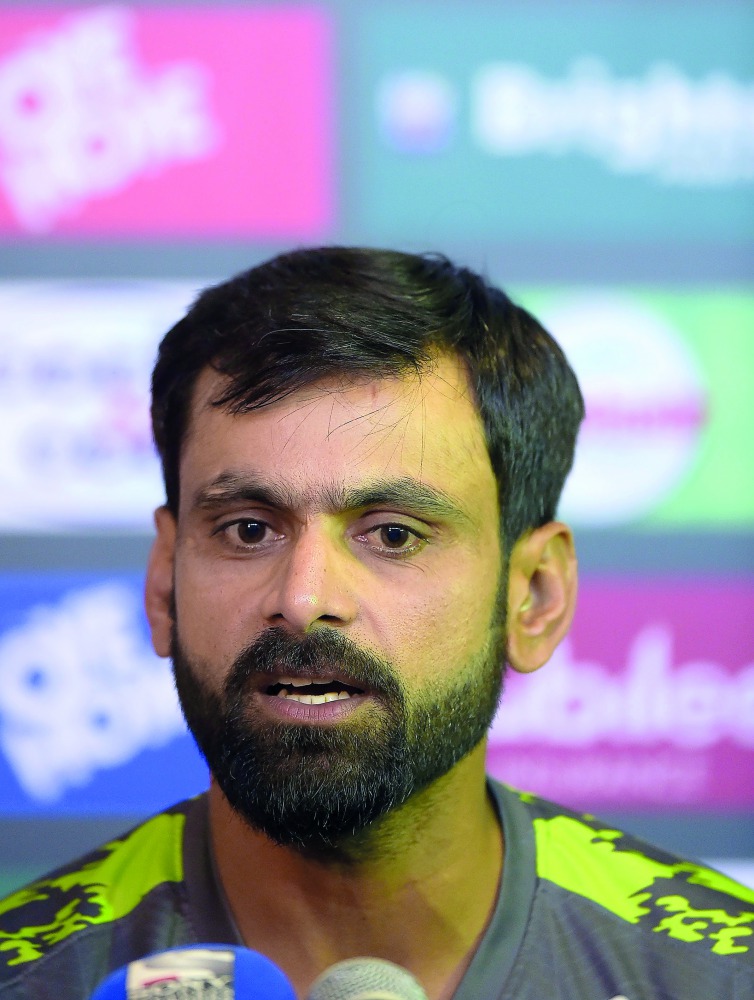 Pakistani cricketer Mohammad Hafeez announces his retirement from Test cricket during a press conference at the Sheikh Zayed International Cricket Stadium in Abu Dhabi on December 4, 2018.  AFP / Aamir Qureshi