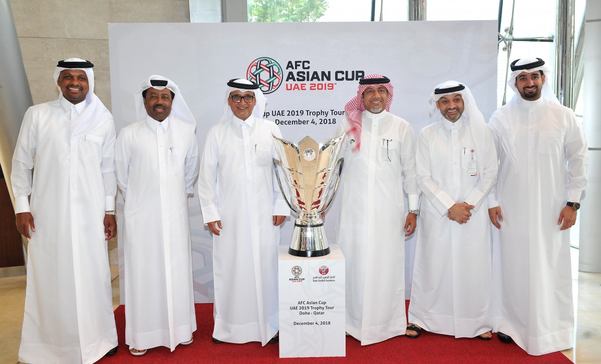 Saoud Al Mohannadi (third left), Vice President of Qatar Football Association (QFA) poses for a picture along with Hani Balan (second right), member of the QFA Executive Committee and Mansoor Al Ansari (right), Secretary General of QFA are seen along with