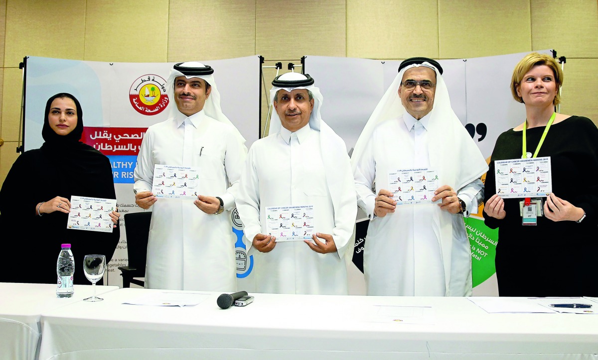 The launch of cancer awareness calendar 2019 held at the Ministry of Public Health yesterday. Seen from left are Dr. Shaikha Abu Shaikha, PHCC; Sheikh Mohammed Hamad J. Al Thani, MoPH; Sheikh Dr. Khalid bin Jabor Al Thani, Chairman, Qatar Cancer Society;