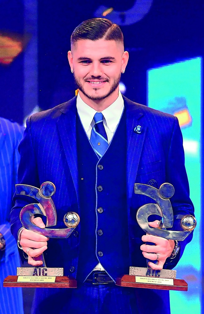 Inter's Argentinian forward Mauro Icardi receives the award for the best player of 2018 at the 