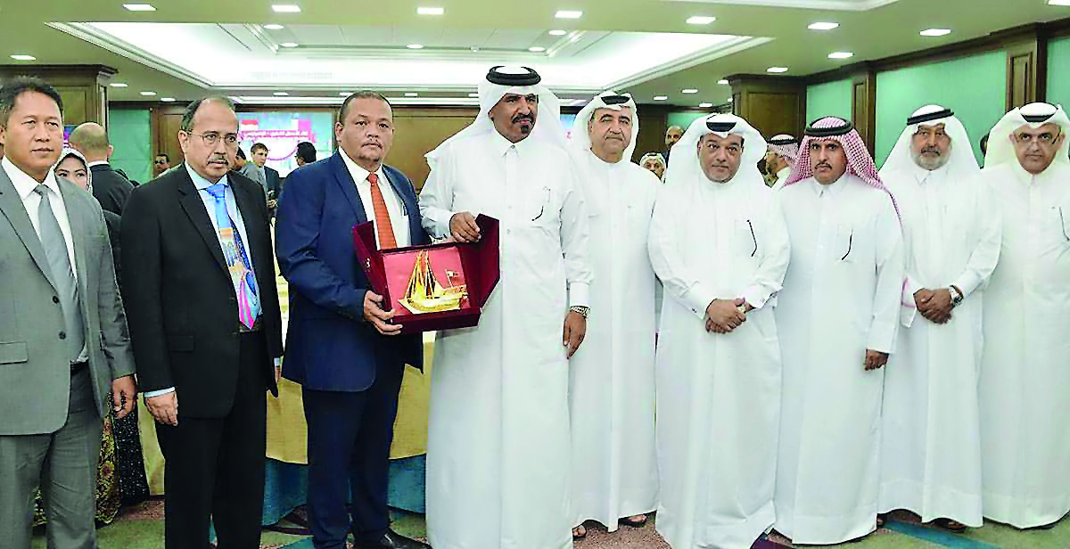 Qatar Chamber First Vice-President Mohammed bin Ahmed bin Towar, along with other chamber officials, presenting a memento to the head of the visiting Indonesian delegation, yesterday.