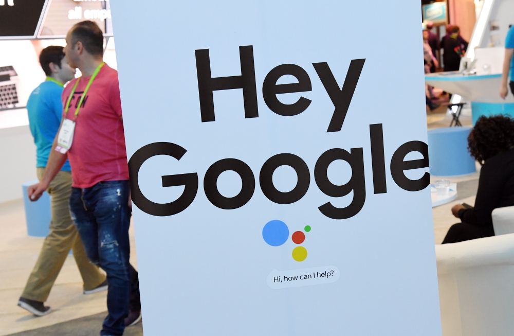 (FILES) In this file photo taken on January 9, 2018 a sign for the Google Assistant is displayed during CES 2018 at the Sands Expo and Convention Center in Las Vegas, Nevada. AFP / GETTY IMAGES NORTH AMERICA / Ethan Miller