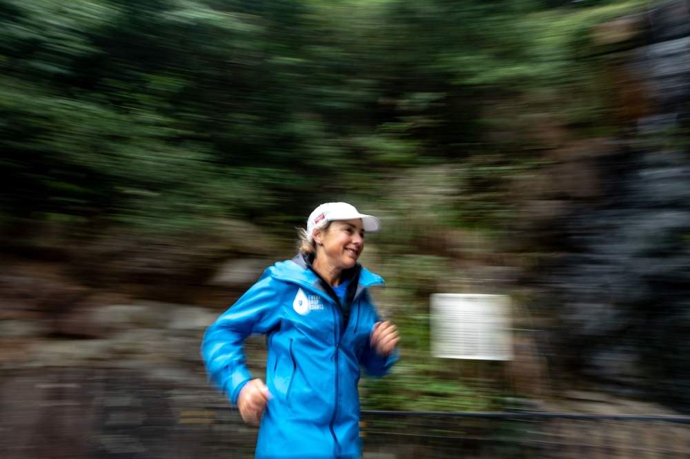 In this picture taken on December 8, 2018, Australian marathon runner Mina Guli runs on the track at the Peak in Hong Kong. AFP / Philip FONG 
