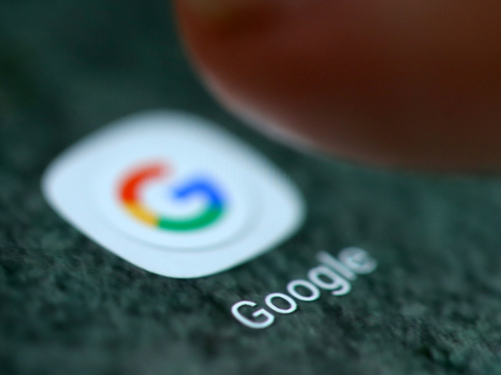 File photo of the Google app logo is seen on a smartphone in this picture illustration taken September 15, 2017. REUTERS/Dado Ruvic/Illustration/File Photo