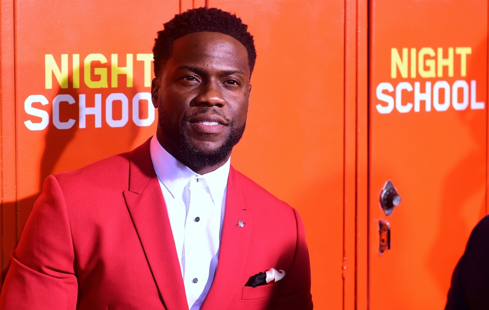 In this file photo taken on September 24, 2018 actor Kevin Hart arrives for the premiere of 'Night School' in Los Angeles, California. AFP / Frederic J Brown
 