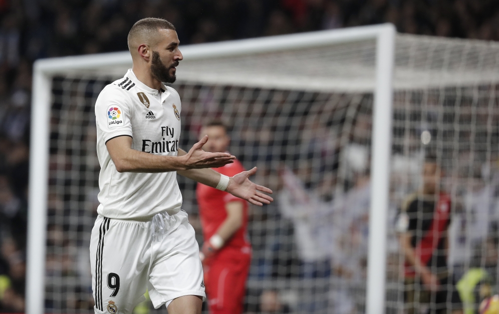 Karim Benzema of Real Madrid celebrates his goal during the Spanish League La Liga football match between Real Madrid and Rayo Vallecano at the Santiago Bernabeu stadium in Madrid, Spain on December 15, 2018. Burak Akbulut - Anadolu