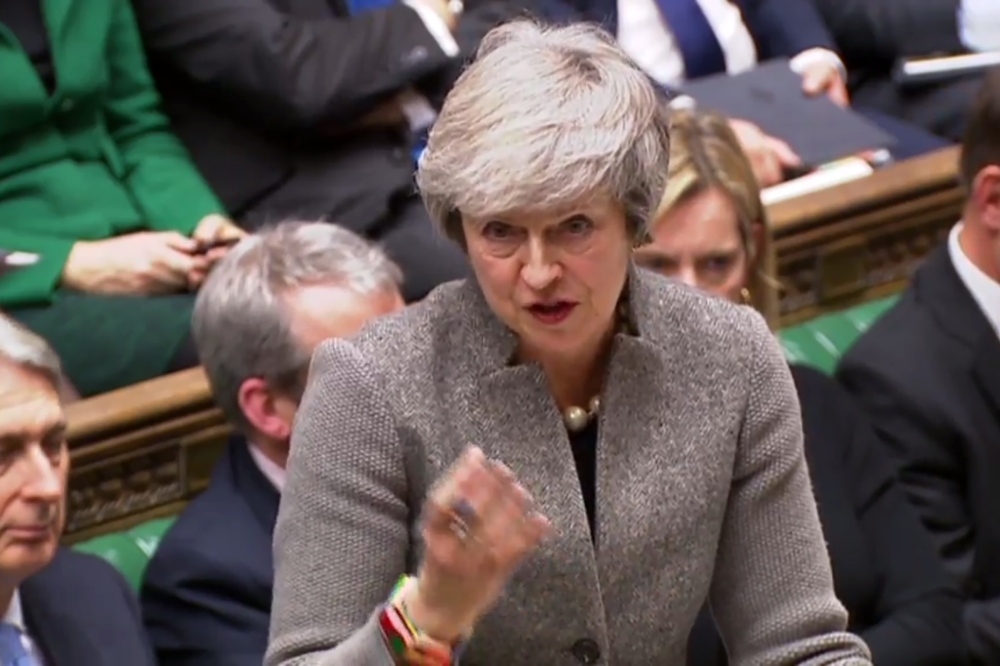 A video grab from footage broadcast by the UK Parliament's Parliamentary Recording Unit (PRU) shows Britain's Prime Minister Theresa May answering questions after making a statement to the House of Commons in London on December 17, 2018, following her att
