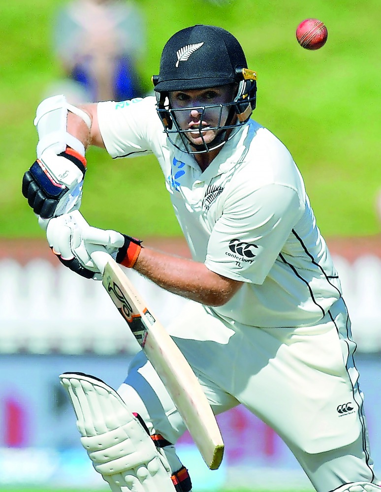 New Zealand's Tom Latham plays a shot during day three of the first Test cricket match between New Zealand and Sri Lanka at the Basin Reserve in Wellington on December 17, 2018. AFP / Marty Melville
