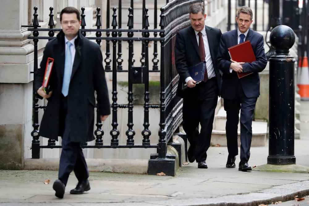 Britain's Housing, Communities and Local Government Secretary James Brokenshire (L), Britain's Justice Secretary and Lord Chancellor David Gauke (C) and Britain's Defence Secretary Gavin Williamson arrives to attend the weekly meeting of the Cabinet at 10