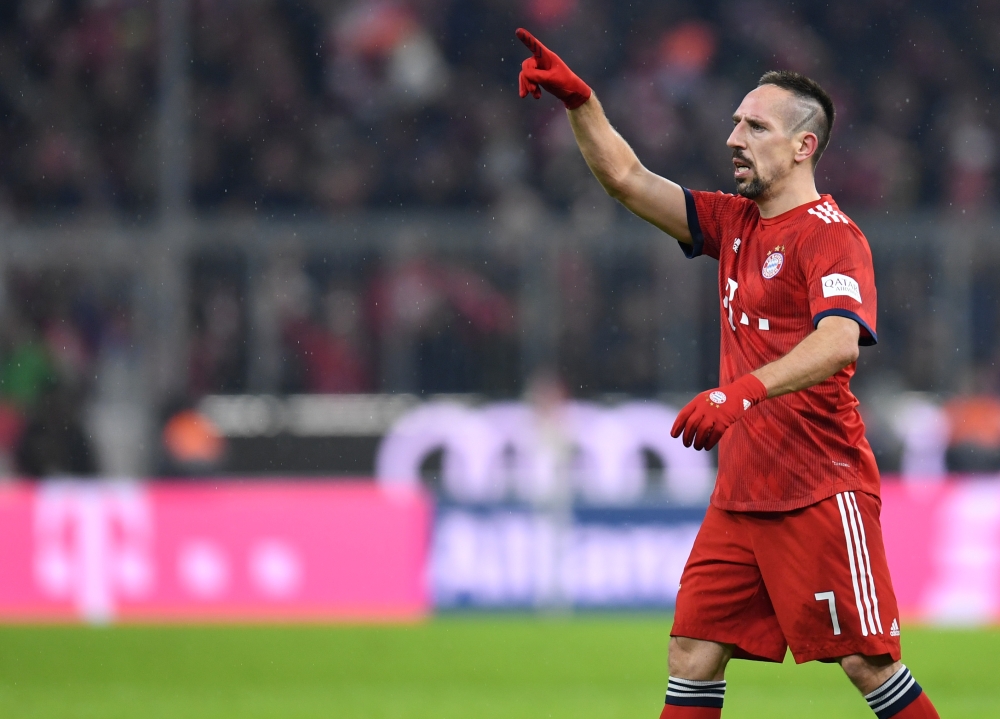 Bayern Munich's French midfielder Franck Ribery celebrates after the first goal for Munich during the German first division football match between 1 FC Bayern Munich and RB Leipzig in Munich, southern Germany, on December 19, 2018. AFP / Christof STACHE 