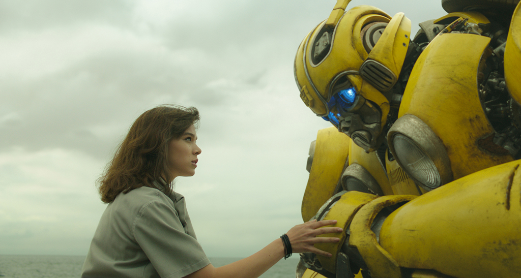 A still of Hailee Steinfeld and Bumblebee from the movie 