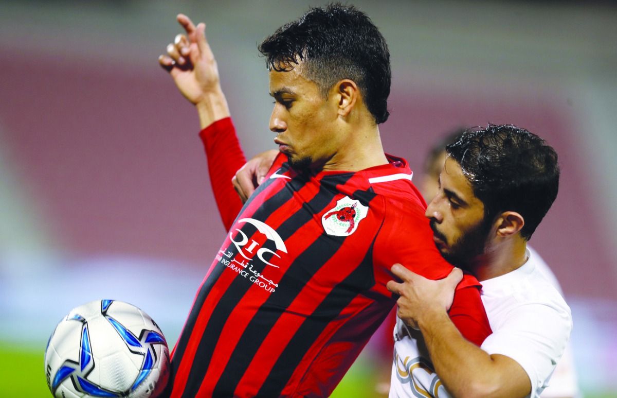 Al Rayyan’s Lucca Borges Brito (left) vies for the ball with an Al Sailiyah player during their QSL Cup Group B match yesterday.