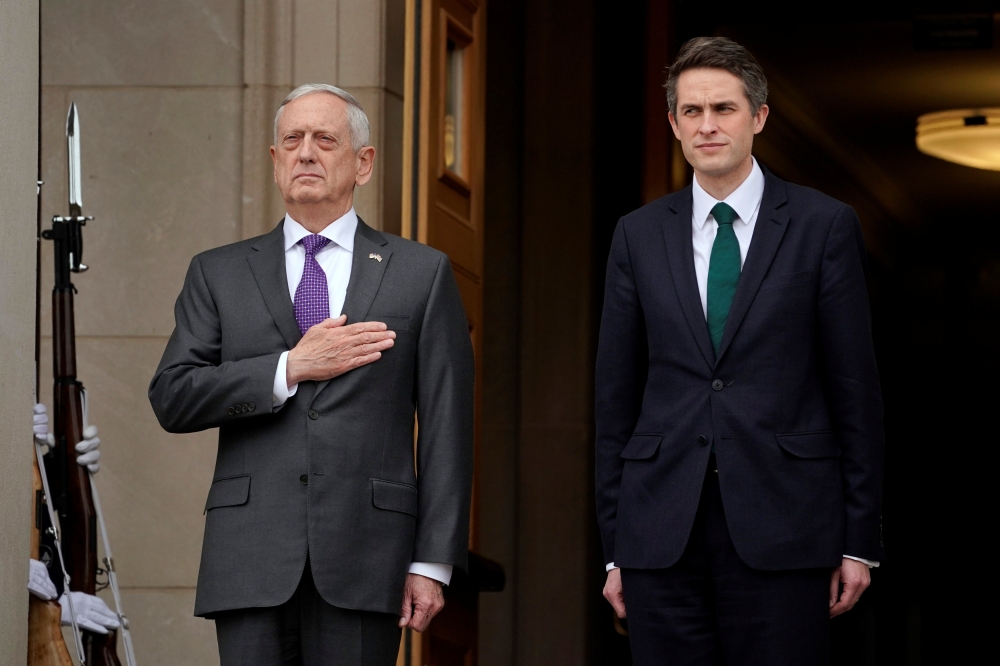 James Mattis welcomes British State Secretary for Defense Gavin Williamson to the Pentagon in Arlington, Virginia, February 1, 2018. Reuters/Yuri Gripas