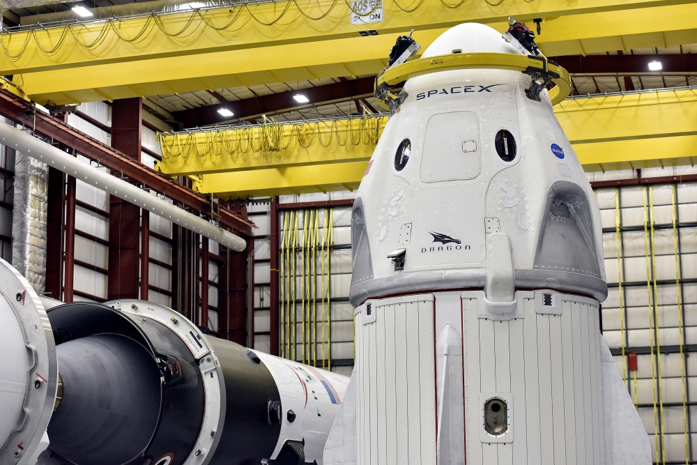 The Dragon crew capsule sits in the SpaceX hangar at Launch Complex 39-A, where the space ship and Falcon 9 booster rocket are being prepared for a January 2019 launch at Cape Canaveral, Florida, U.S. December 18, 2018. REUTERS/Steve Nesius