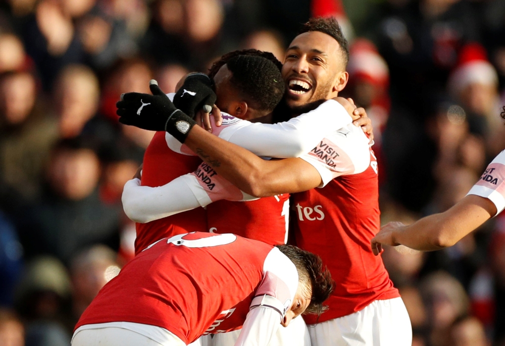Arsenal's Alex Iwobi celebrates scoring their third goal with Pierre-Emerick Aubameyang and team mates Action Images via Reuters/John Sibley