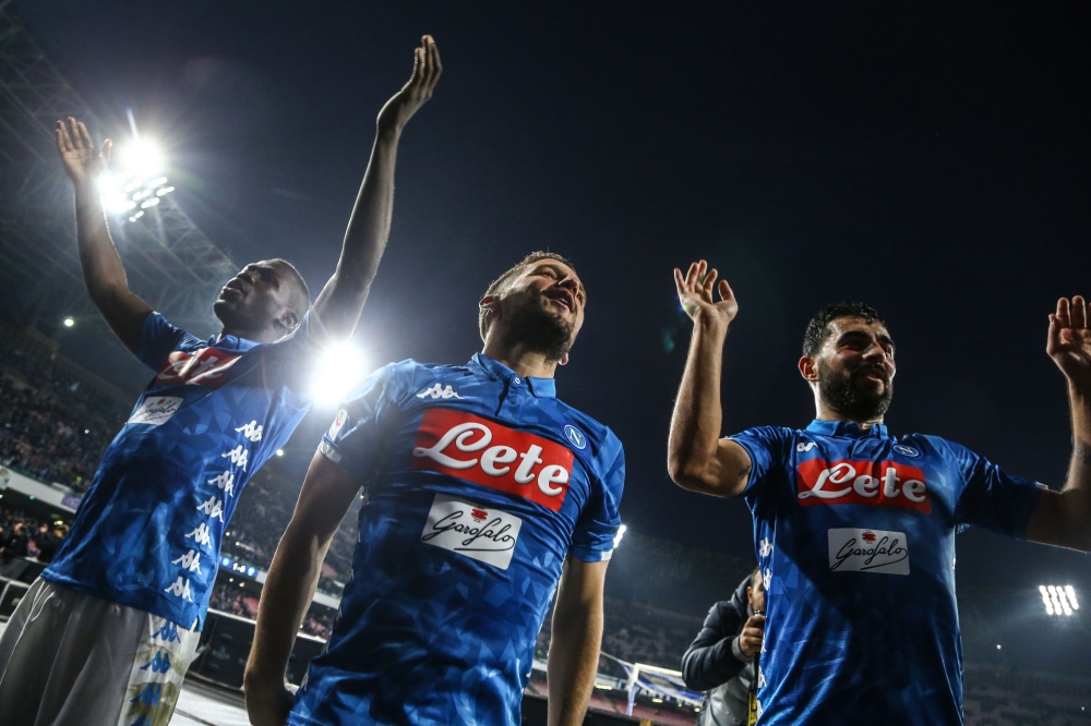 (From L) Napoli's Senegalese defender Kalidou Koulibaly, Napoli's Belgian forward Dries Mertens and Napoli's Spanish defender Raul Albiol celebrate at the end of the Italian Serie A Football match Napoli vs SPAL 2013 on December 22, 2018 at the San Paolo 