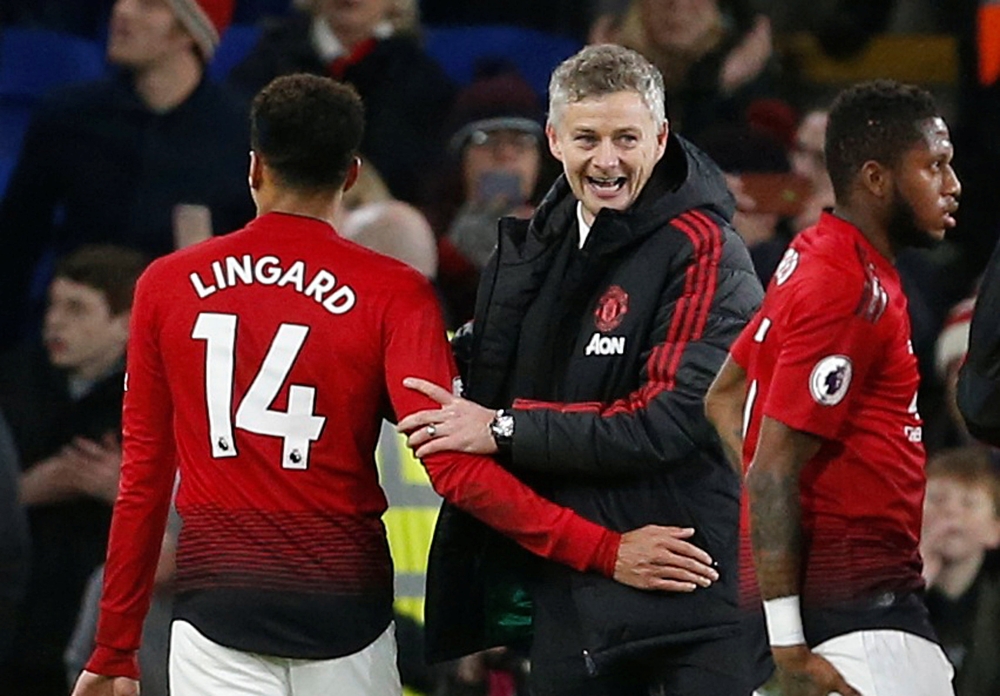 Manchester United interim manager Ole Gunnar Solskjaer celebrates after the match with Jesse Lingard,  December 22, 2018. Action Images via Reuters/Craig Brough 