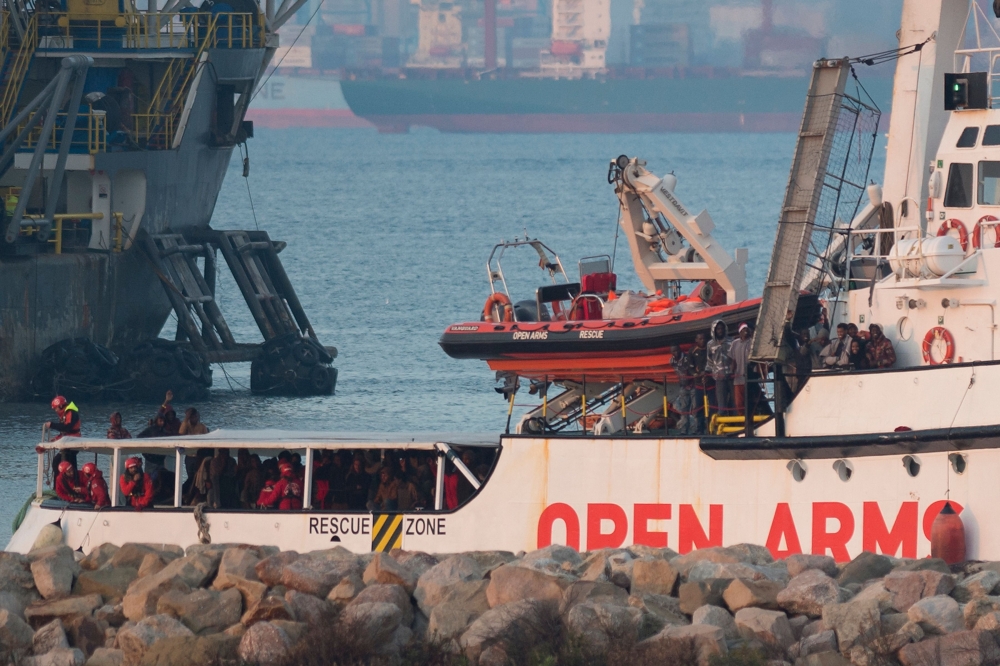 The ship of Spanish NGO Proactiva Open Arms arrives in the southern Spanish port of Algeciras in Campamento near San Roque, with 311 migrants on board,on December 28, 2018. AFP / JORGE GUERRERO