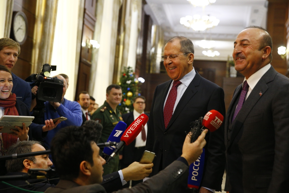 Minister of Foreign Affairs of Russia, Sergey Lavrov (2nd R) and Minister of Foreign Affairs of Turkey, Mevlut Cavusoglu (R) speak to press members after their meeting on Syria in Moscow, Russia on December 29, 2018. ( Sefa Karacan - Anadolu 