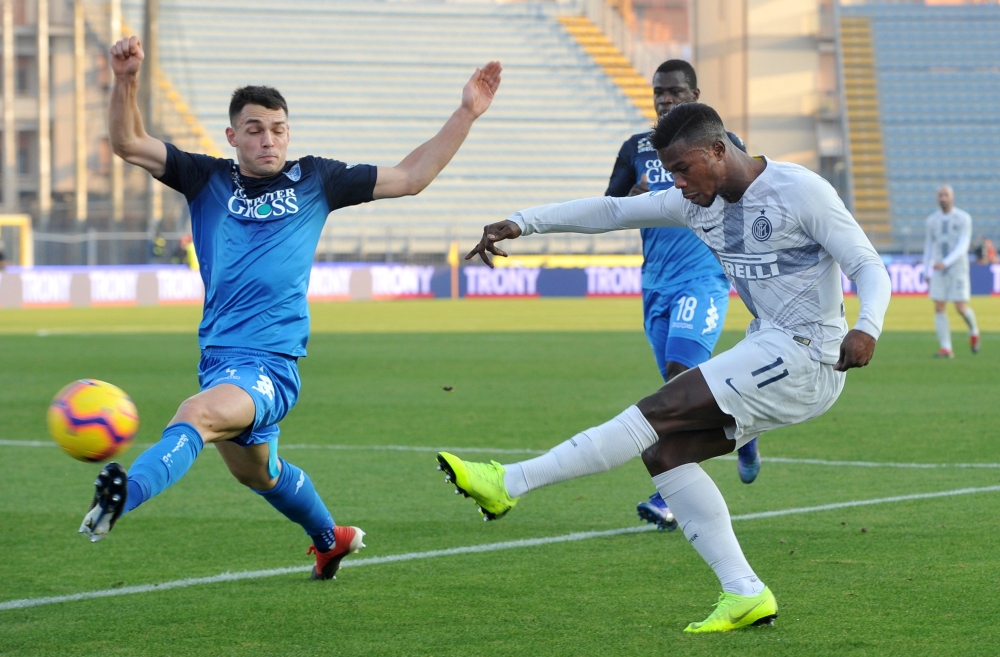 Inter Milan's Keita Balde shoots at goal REUTERS/Jennifer Lorenzini