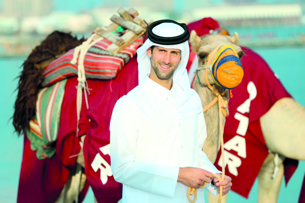 Serbia’s Novak Djokovic poses for a photograph at the Katara Cultural Village in Doha yesterday. 