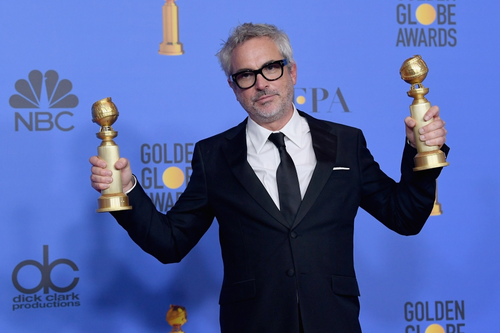 Best Director - Motion Picture - Roma - and Best Motion Picture - Foreign Language - Roma - winner Alfonso Cuar?n poses in the press room during the 76th Annual Golden Globe Awards at The Beverly Hilton Hotel on January 6, 2019 in Beverly Hills, Californi