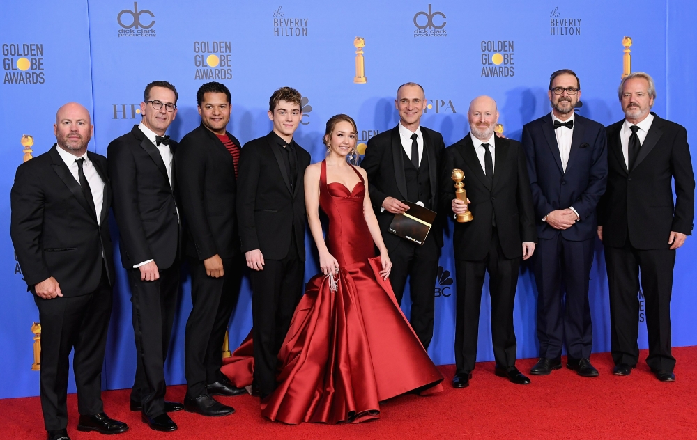 Cast and crew of 'The Americans' including Producer Justin Falvey, Brandon J. Dirden, Keidrich Sellati, Holly Taylor, Producer Joel Fields, producer Joe Weisberg pose in the press room with award for Best Television Series poses in the press room during t