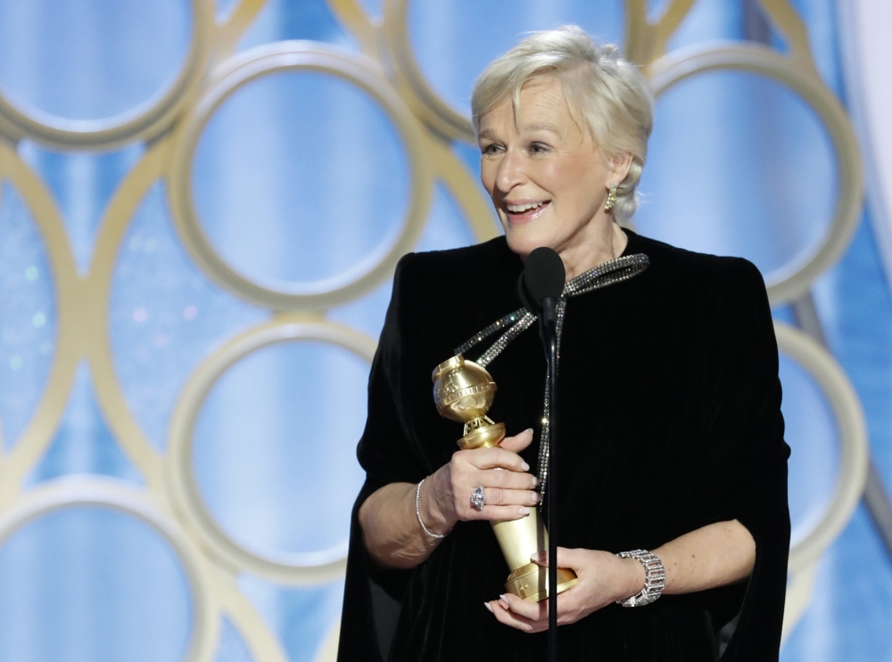  Glenn Close, winner of Best Actress - Motion Picture, Drama, accepts her award. Paul Drinkwater/NBC Universal/Handout via REUTERS