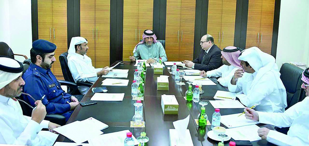 Ali bin Abdul Latif Al Misnad (centre), member of the Board of Directors, Qatar Chamber, and Chairman of the Services Committee, presiding the meeting at QC headquarters, yesterday. 