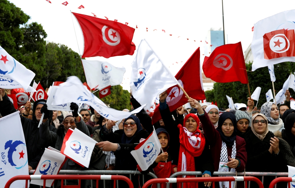 People take part in a demonstration marking the eighth anniversary of the 2011 uprising that unseated former president Zine El-Abidine Ben Ali, in Tunis, Tunisia, January 14, 2019. REUTERS/Zoubeir Souissi