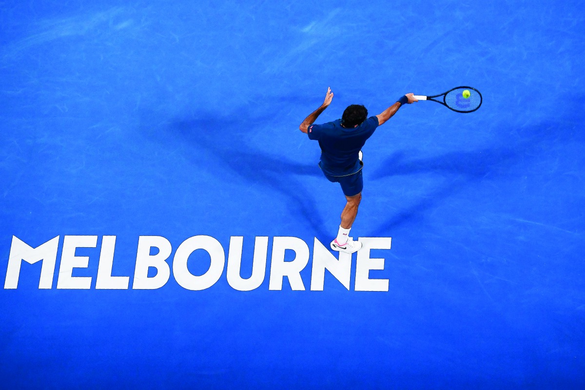 Switzerland's Roger Federer hits a return against Uzbekistan's Denis Istomin during their men's singles match on day one of the Australian Open tennis tournament in Melbourne on January 14, 2019. AFP / Jewel Samad