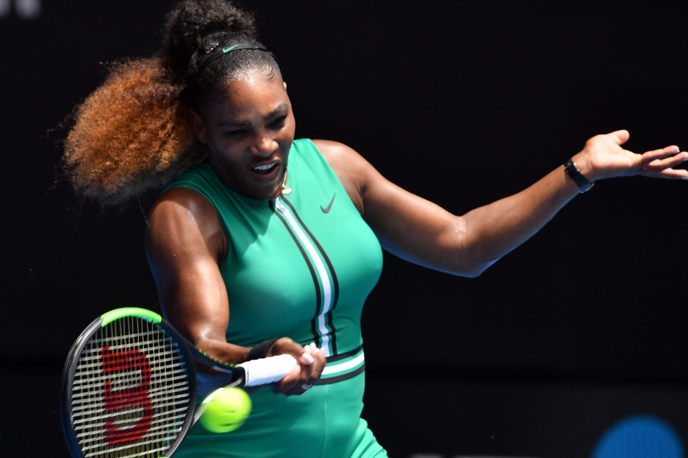 Serena Williams of the US hits a return against Germany's Tatjana Maria during their women's singles match on day two of the Australian Open tennis tournament in Melbourne on January 15, 2019. AFP / Paul Crock 