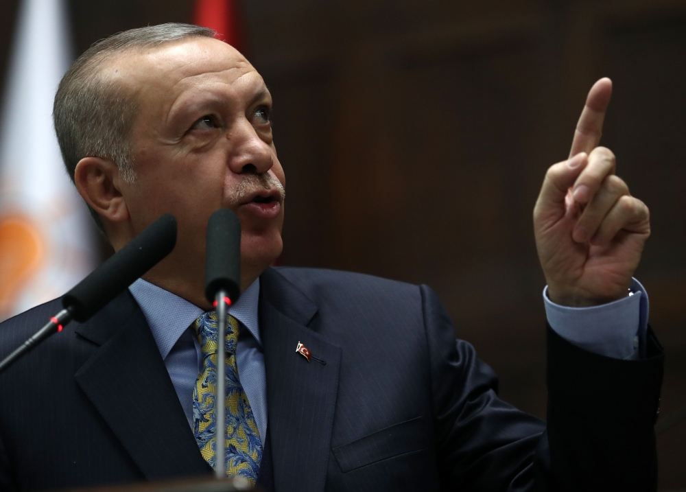 Turkish President and leader of Turkey's ruling Justice and Development (AK) Party Recep Tayyip Erdogan addresses his party's parliamentary group at the Grand National Assembly of Turkey in Ankara, on January 15, 2019. / AFP / Adem ALTAN