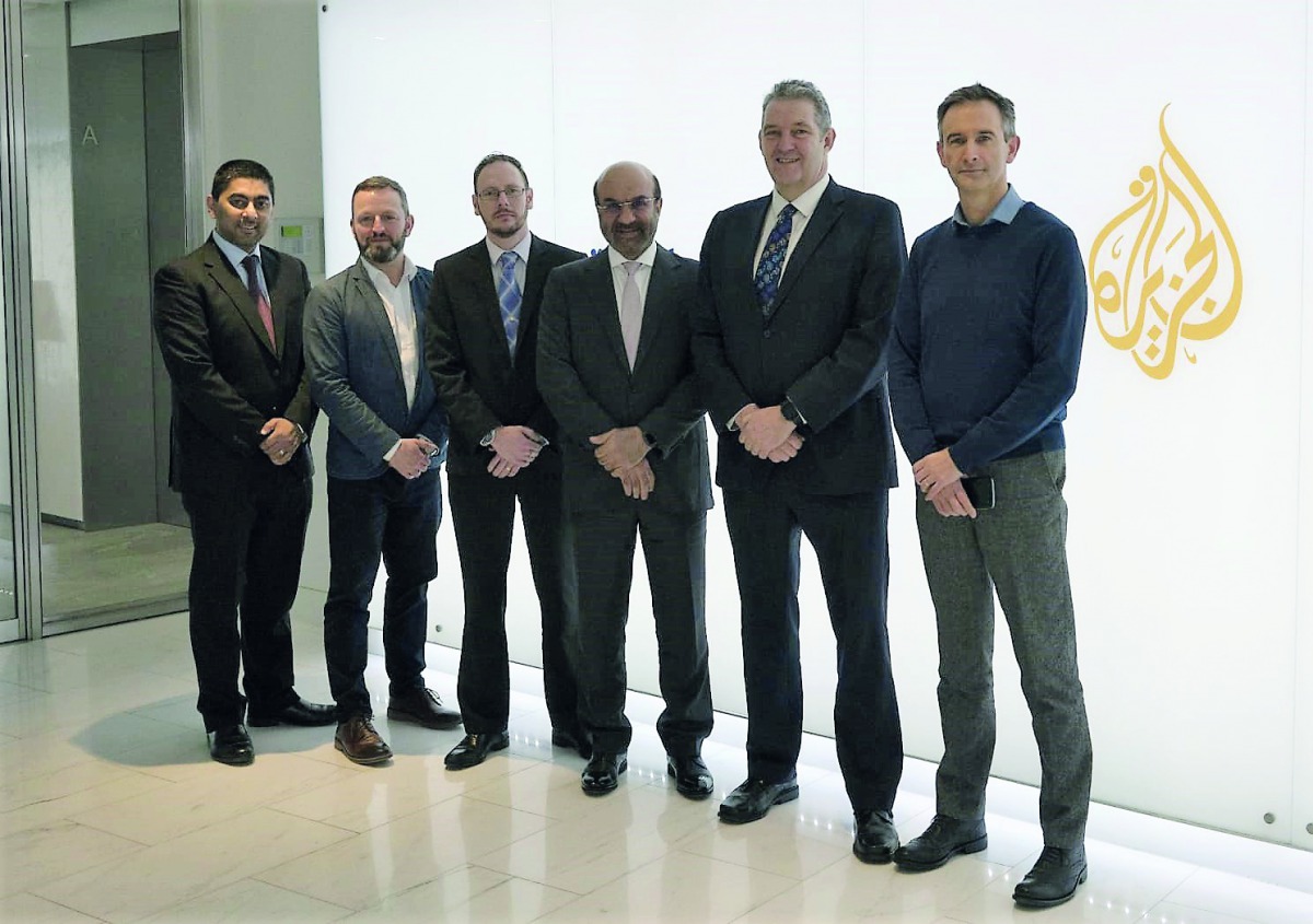 The officials of Al Jazeera Media Network and Techlive International after the signing of the agreement.