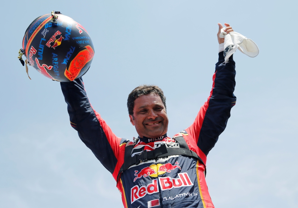 Toyota Gazoo's driver Nasser Al-Attiyah of Qatar celebrates after winning the  Dakar Rally 2019,  Peru, January 17, 2019. Reuters/Carlos Jasso