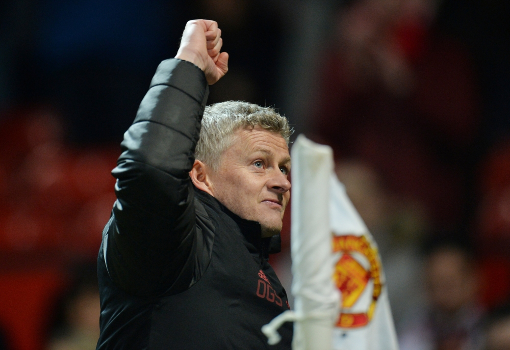 Manchester United interim manager Ole Gunnar Solskjaer celebrates after the match REUTERS/Peter Powell 