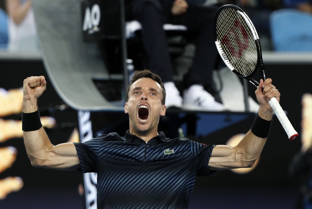 Spain’s Roberto Bautista Agut celebrates after winning the match against Croatia’s Marin Cilic. REUTERS/Aly Song