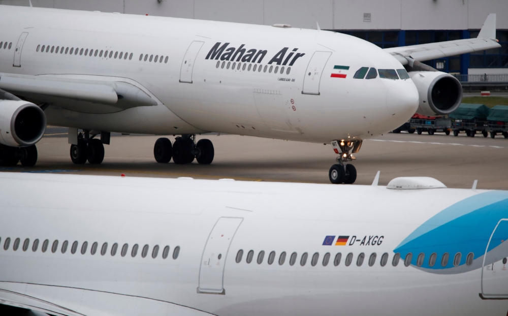 FILE PHOTO: An Airbus A340-300 of Iranian airline Mahan Air taxis at Duesseldorf airport DUS, Germany January 16, 2019. Picture taken January 16, 2019. REUTERS/Wolfgang Rattay